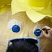 University of Michigan senior Sabrina Palombo paints eyes on her Festifools "prince" creation on Friday, April 5. Daniel Brenner I AnnArbor.com